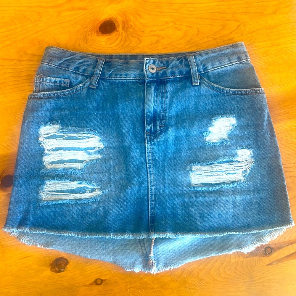 Distressed jean mini skirt